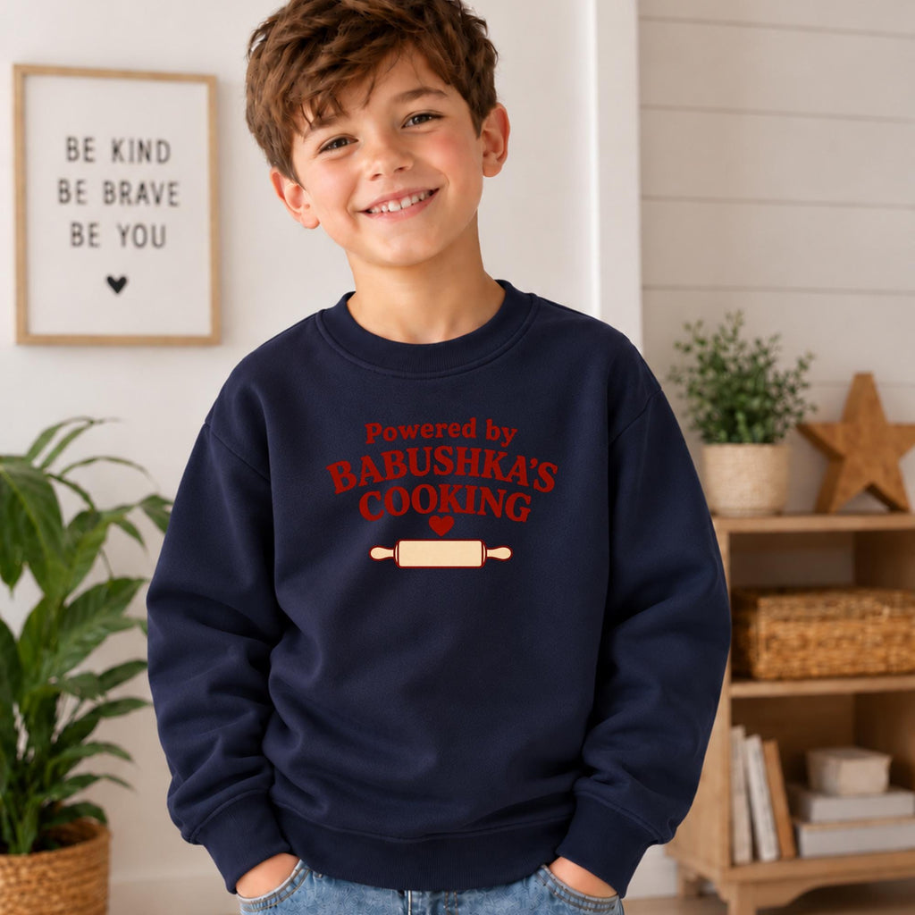 Powered by Babushka’s Cooking Kids Sweatshirt, Russian Grandma Gift, Funny Kids Crewneck, Essential Fleece Pullover, Grandchild Gift