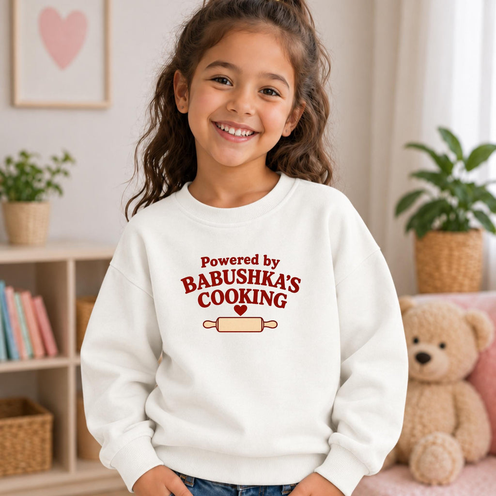 Powered by Babushka’s Cooking Kids Sweatshirt, Russian Grandma Gift, Funny Kids Crewneck, Essential Fleece Pullover, Grandchild Gift