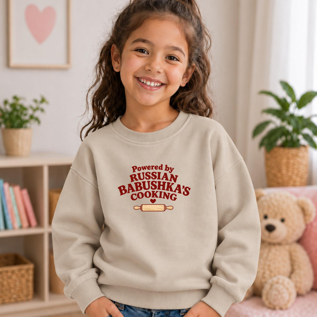 Powered by Russian Babushka’s Cooking Kids Sweatshirt, Funny Russian Grandma Gift, Essential Fleece Crewneck, Grandchild Gift